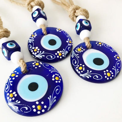 Hand painted evil eye wall hanging