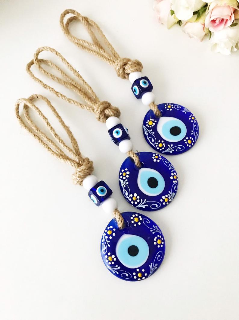 Hand painted evil eye wall hanging