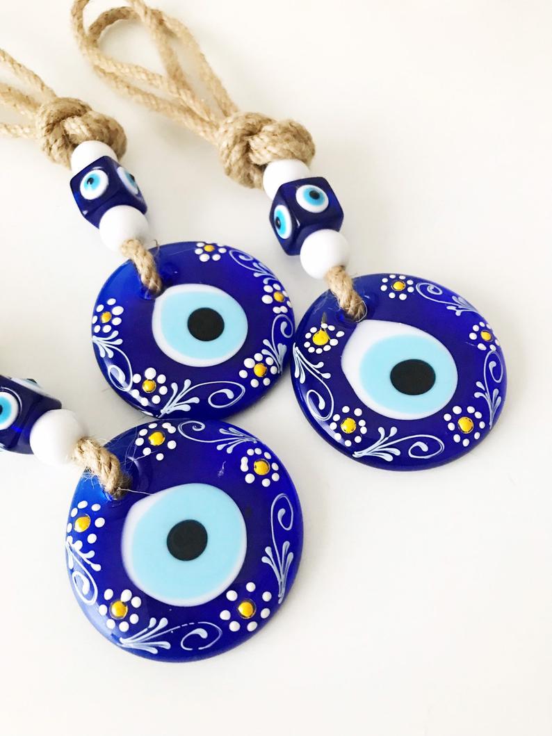 Hand painted evil eye wall hanging