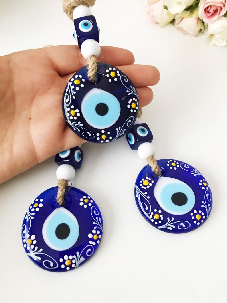 Hand painted evil eye wall hanging