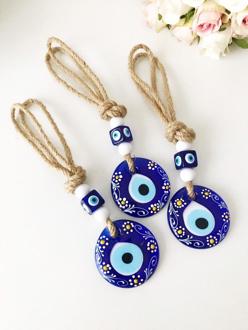 Hand painted evil eye wall hanging