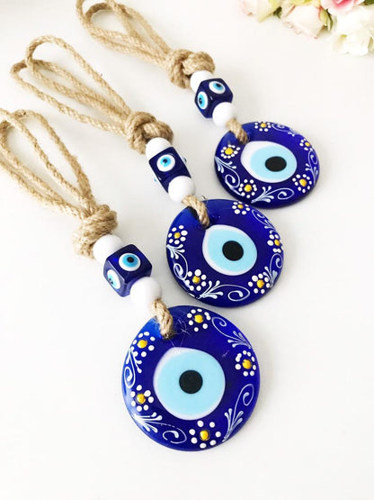 Hand painted evil eye wall hanging